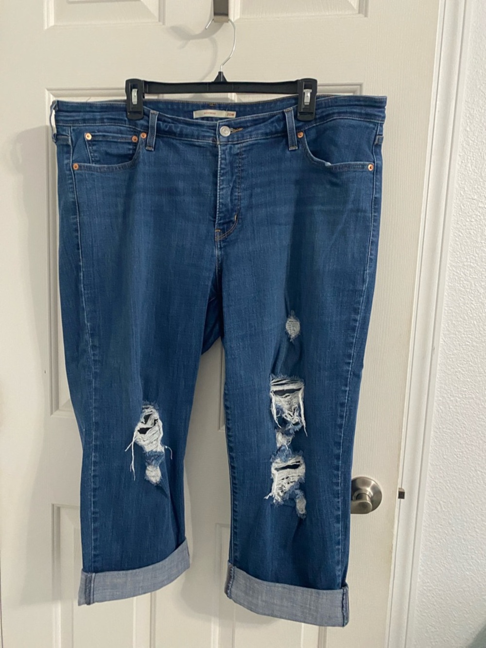 Levi's Dark Blue Distressed Ankle Jeans